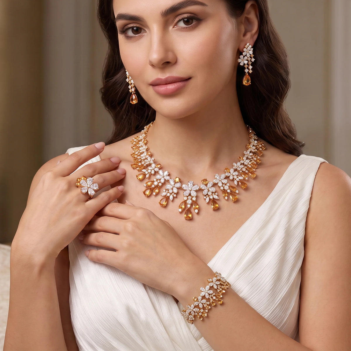 طقم كبير مرصع بأحجار الزركون البيضاء Big set embellished with a row of white zircon stones.