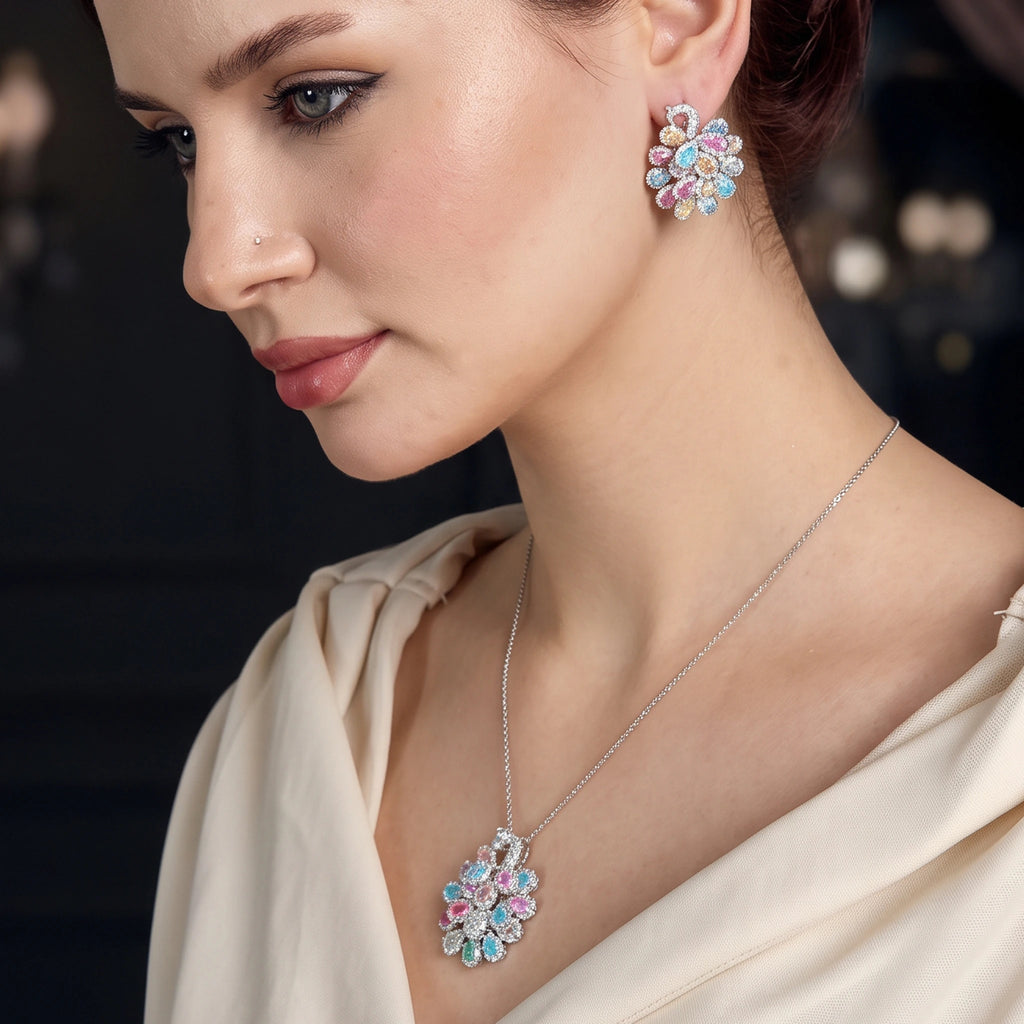 طقم مجوهرات بالأحجار الملونة بدرجات الباستيل الزاهية Jewelry set featuring gemstones in vibrant pastel shades.