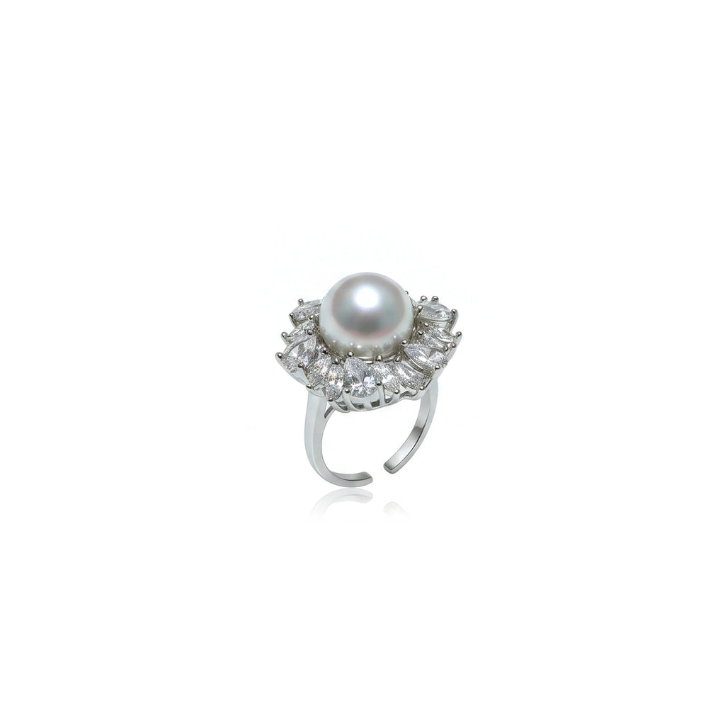 طقم فاخر كلاسيكي من احجار الزركون و اللؤلؤ Luxurious, classic Big-set featuring zircon stones and pearls.