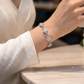 سوار "هالو" بتصميم رباعي الأوراق وحلقة اللانهاية Four-Petal Clover & Infinity Link Halo Bracelet